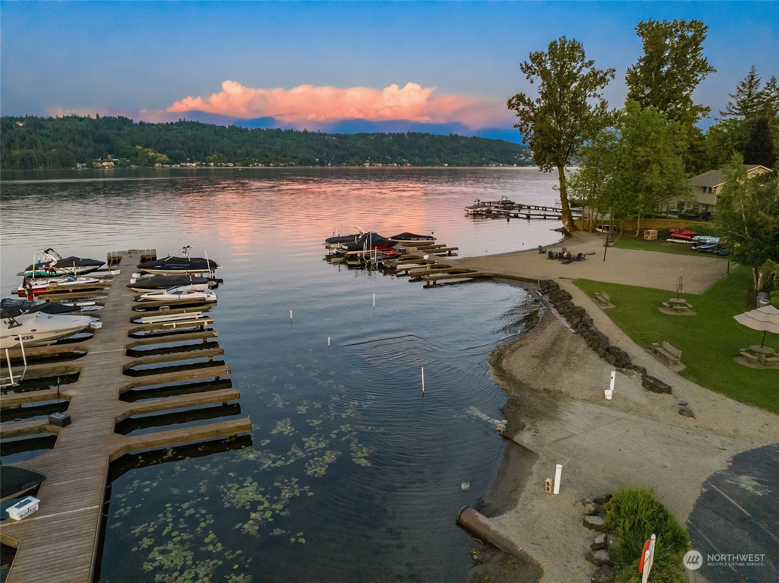 a view of a lake with a yard