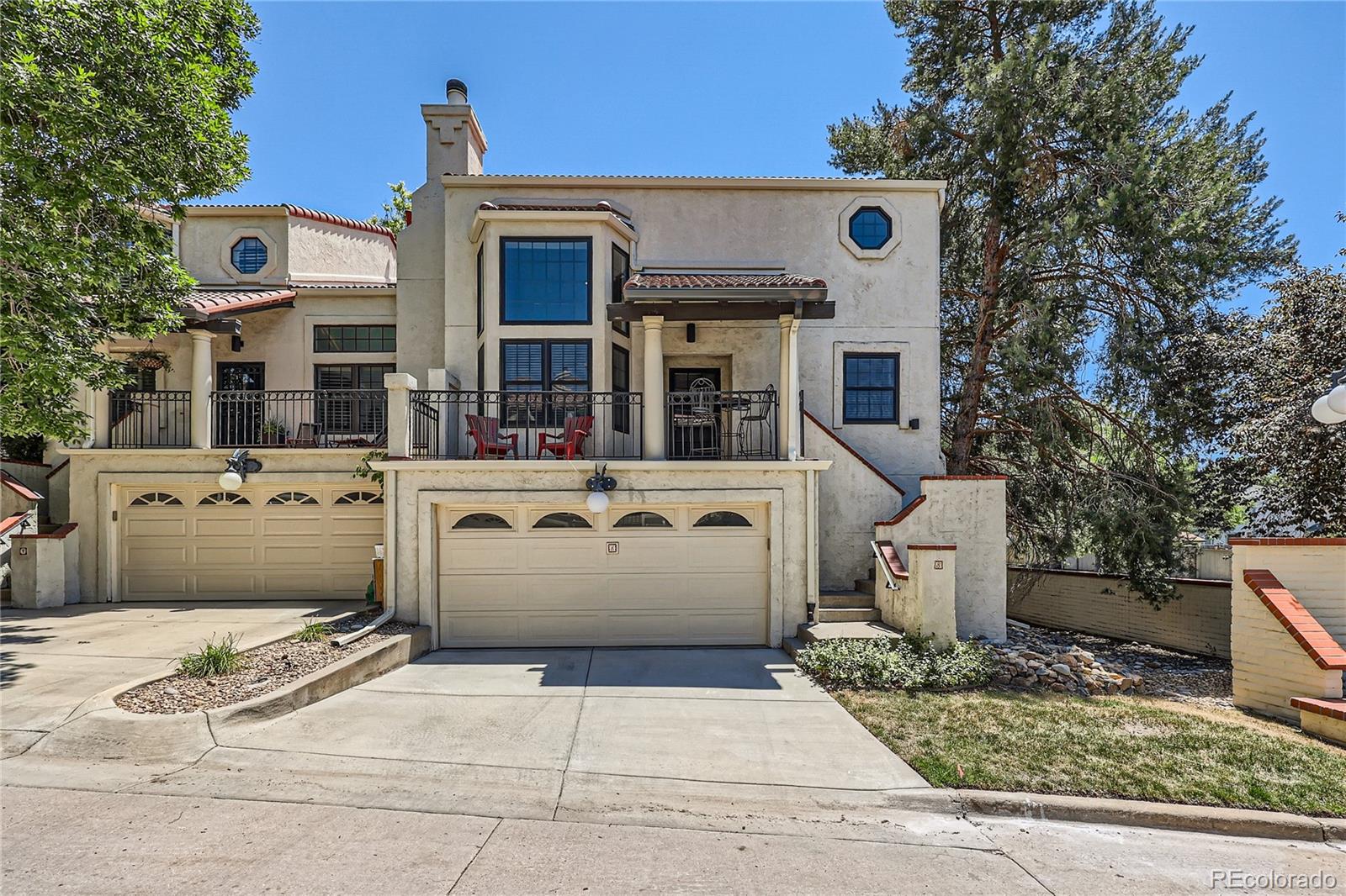 a front view of a house with a garage