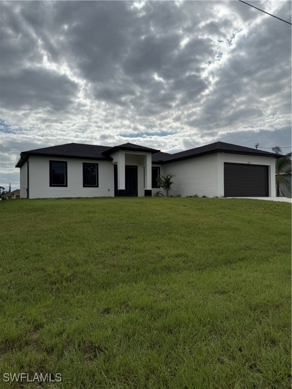 a view of a house with a yard