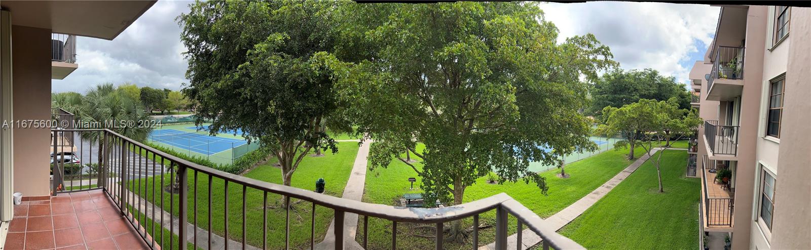 a view of a balcony with an outdoor space