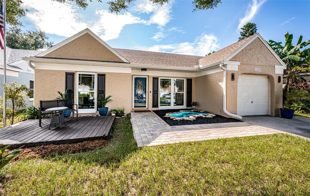 a view of house with outdoor space