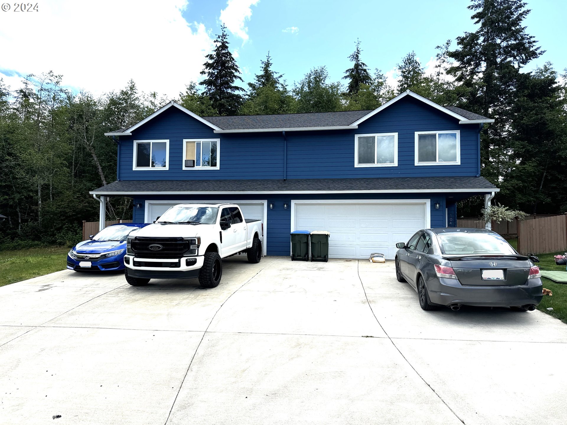 a car parked in front of a house