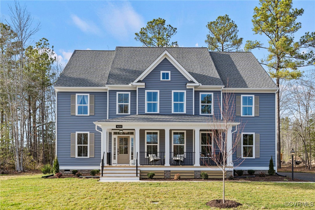 front view of a house with a yard