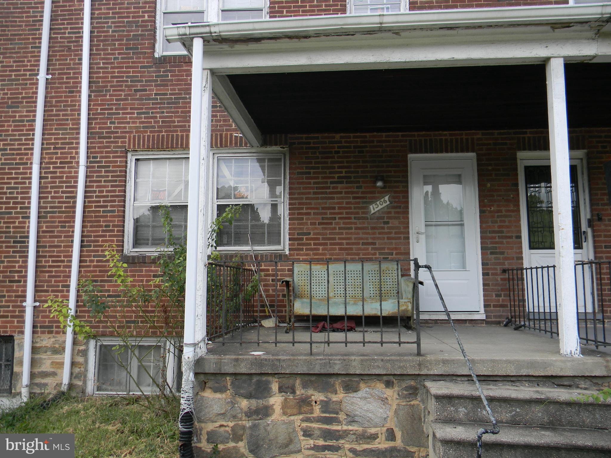 a front view of a house with a garage