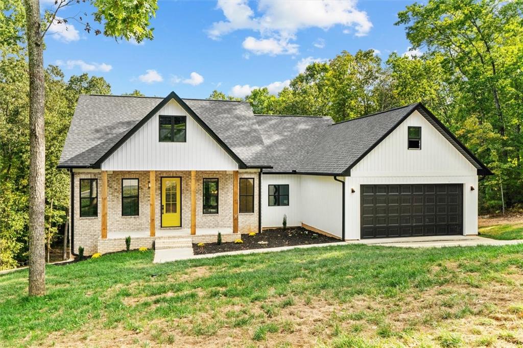 front view of a house with a yard