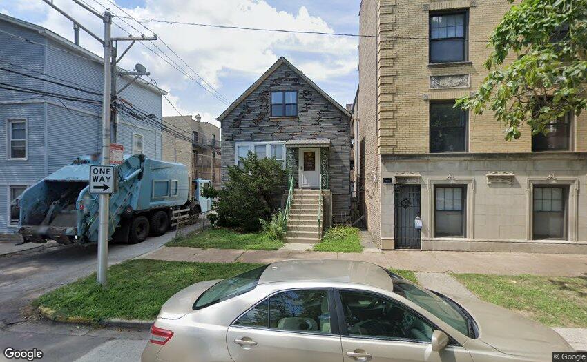 a front view of house with yard