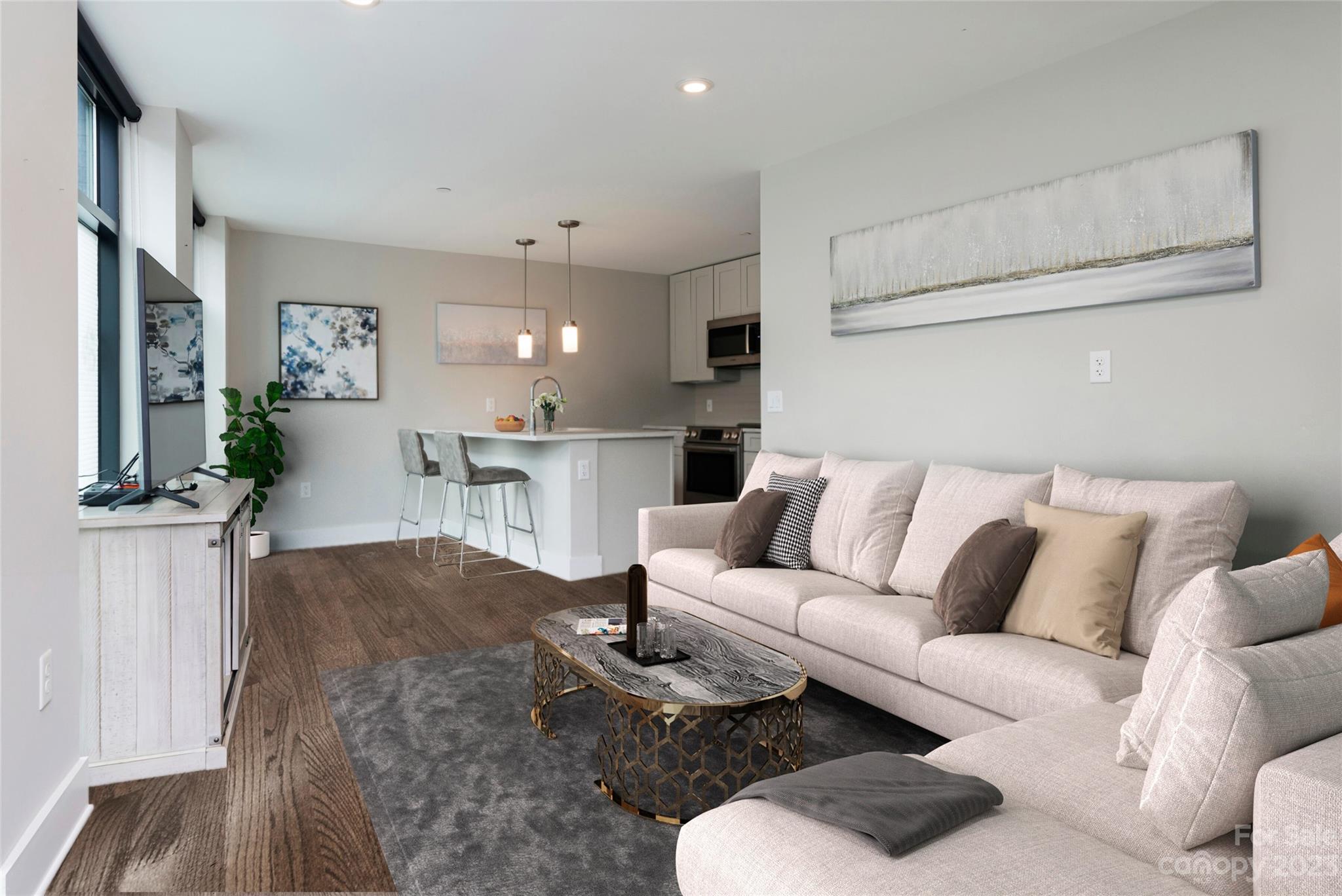 a living room with furniture and a couch