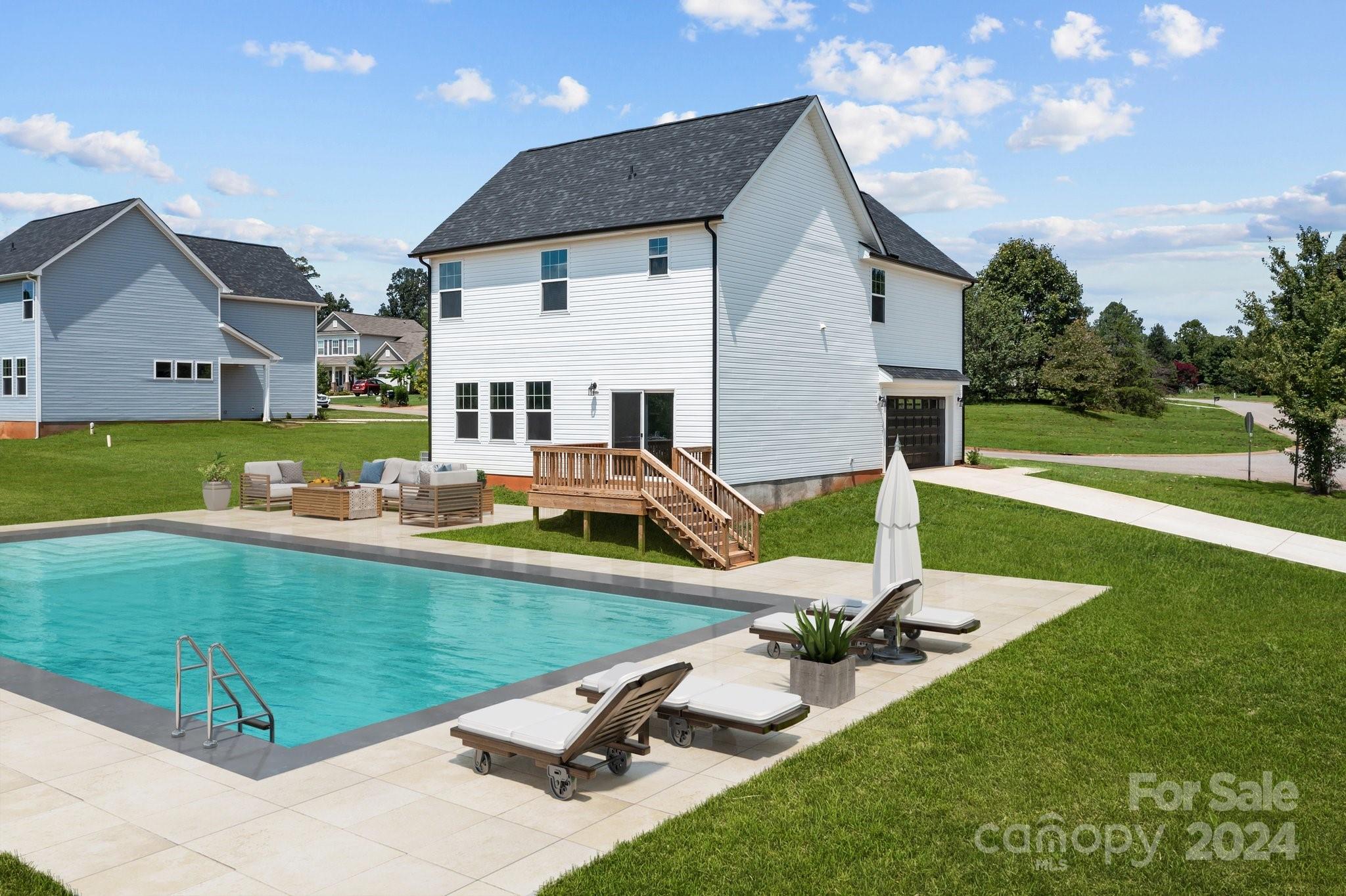 a view of a swimming pool with a patio