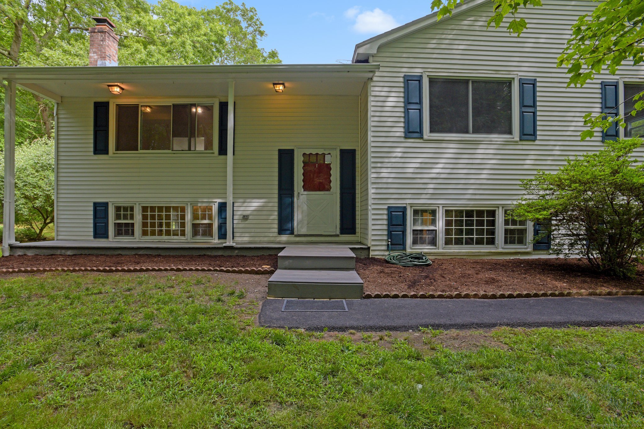 a front view of house with yard