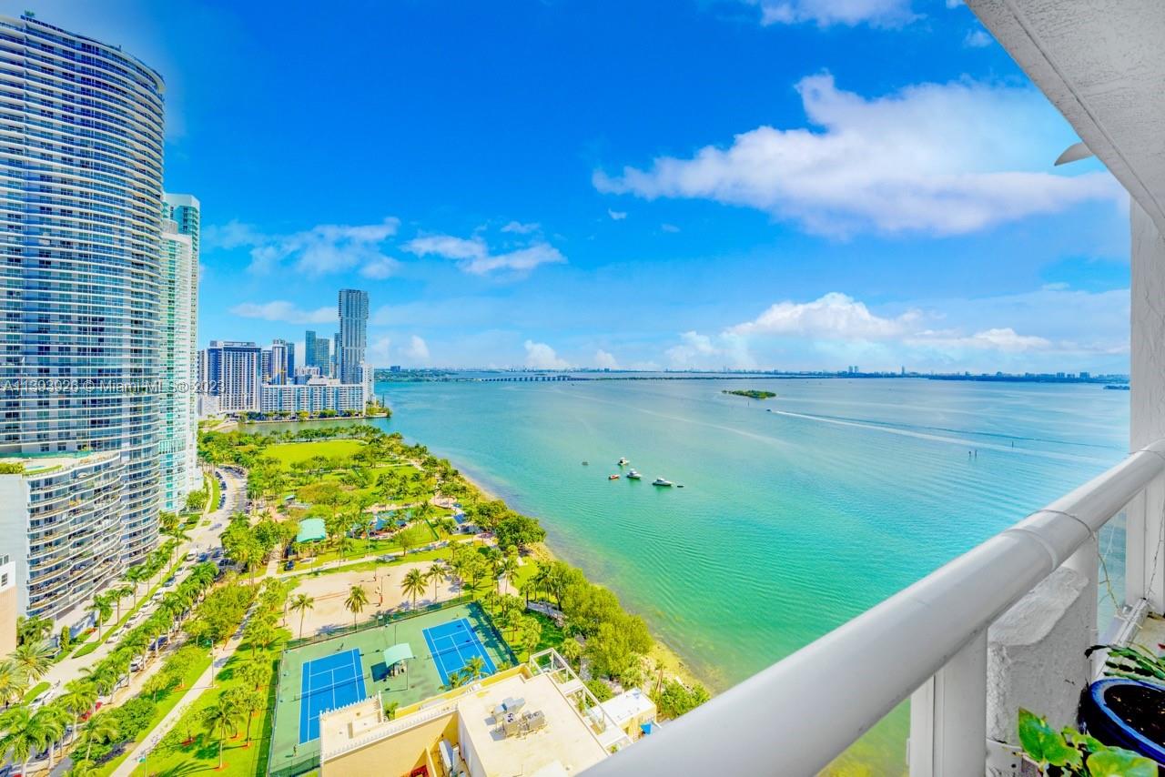 a view of swimming pool from a balcony