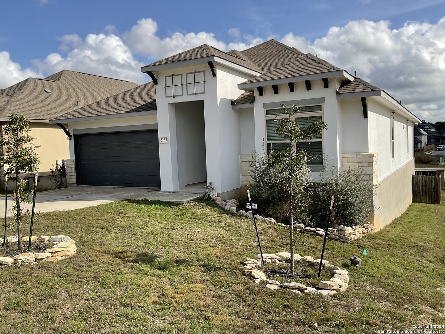 a front view of house with yard