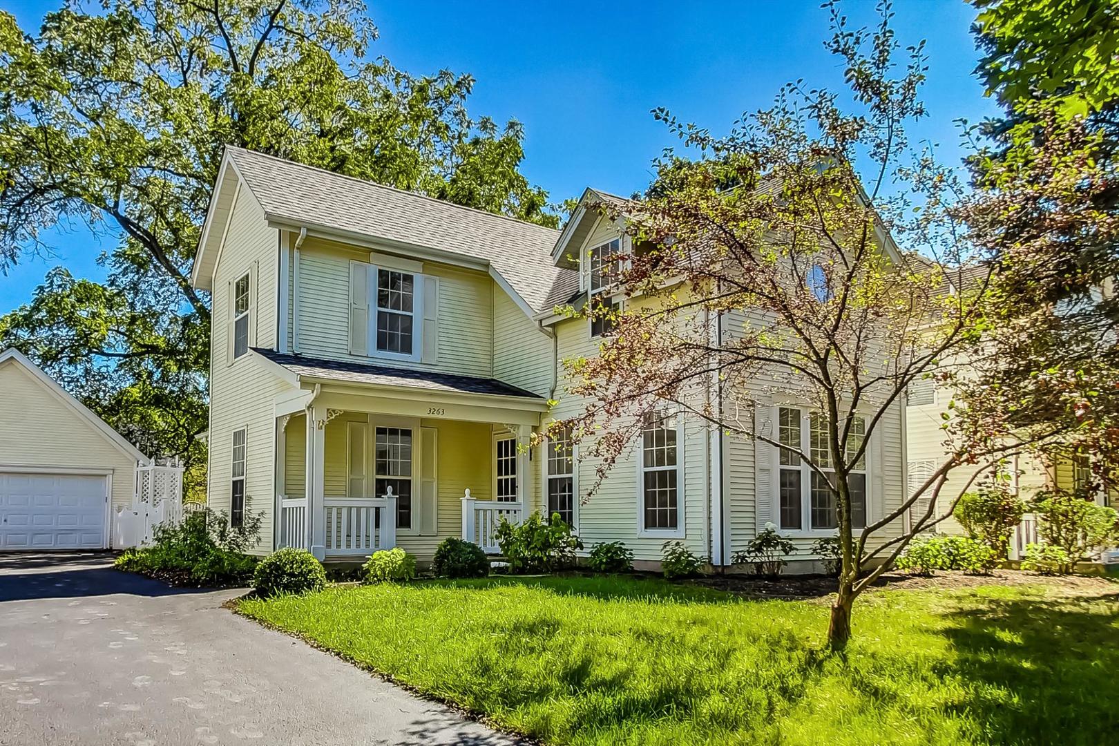 a view of a yard in front of a house