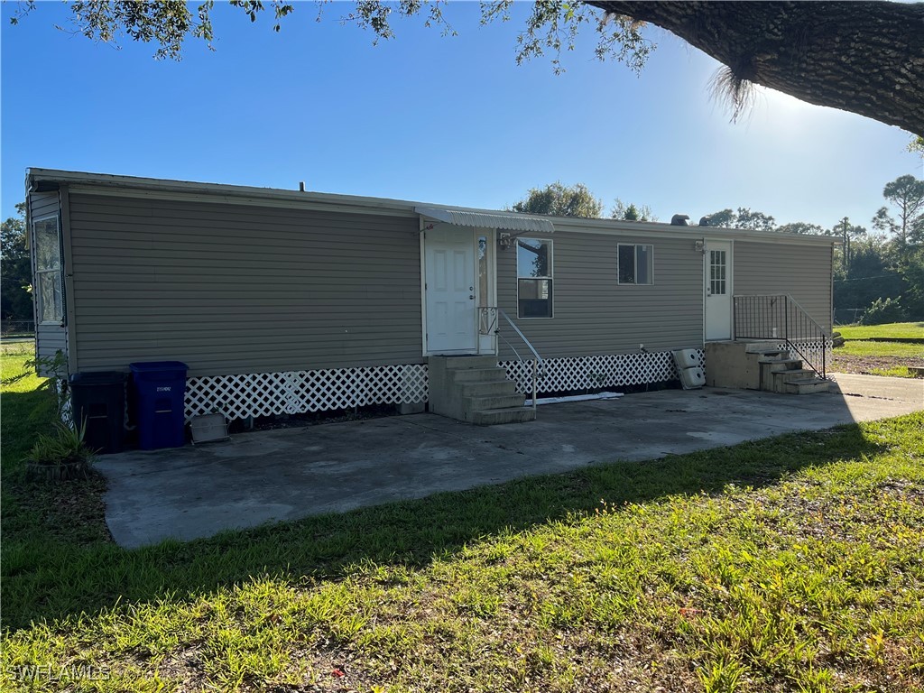 a view of a back yard of the house