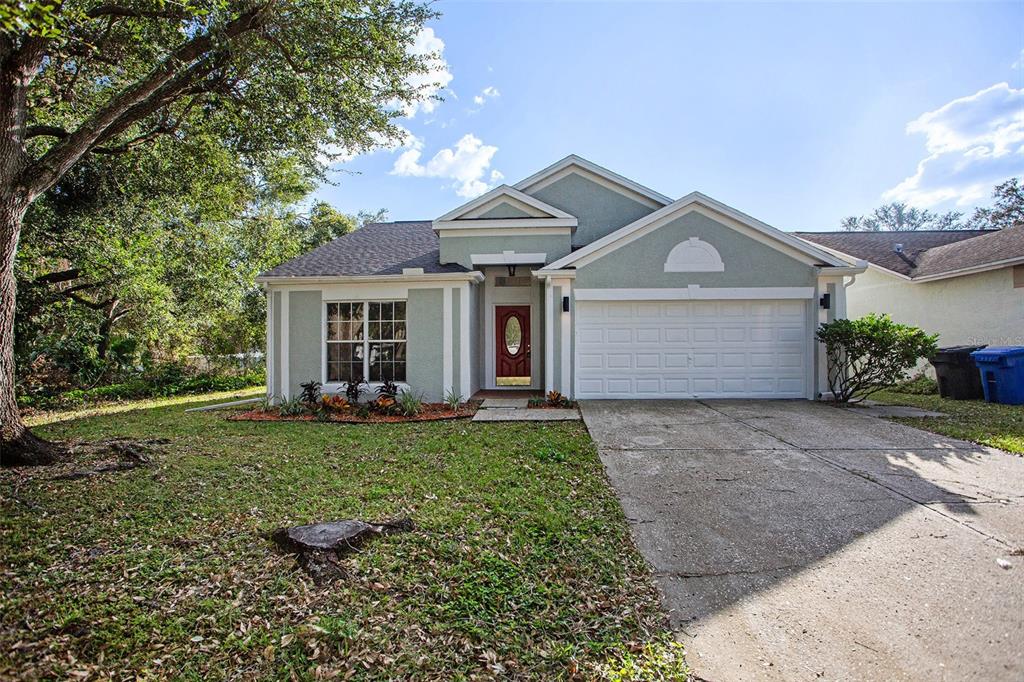 front view of a house with a garden