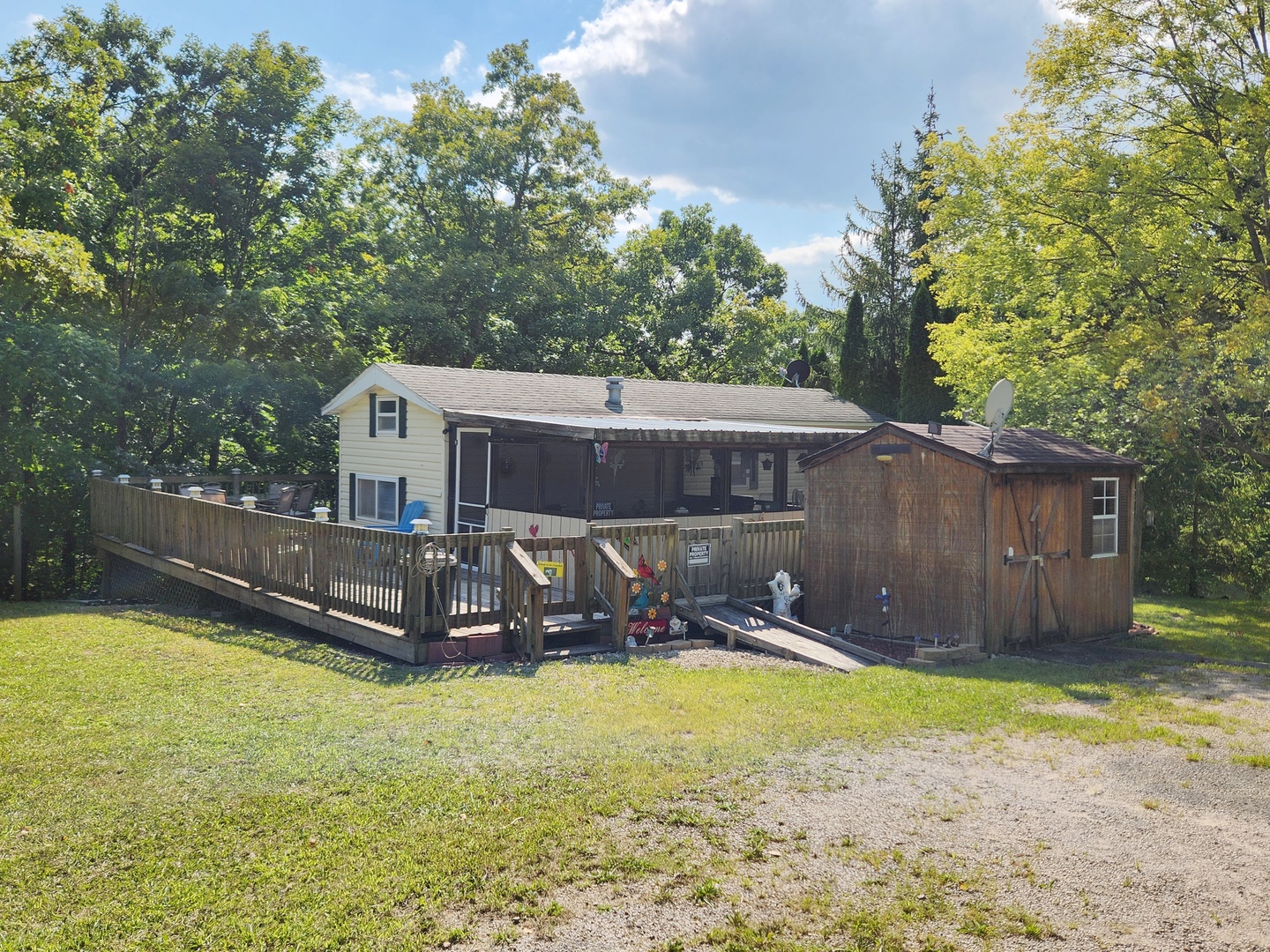 a view of a backyard with a small pool