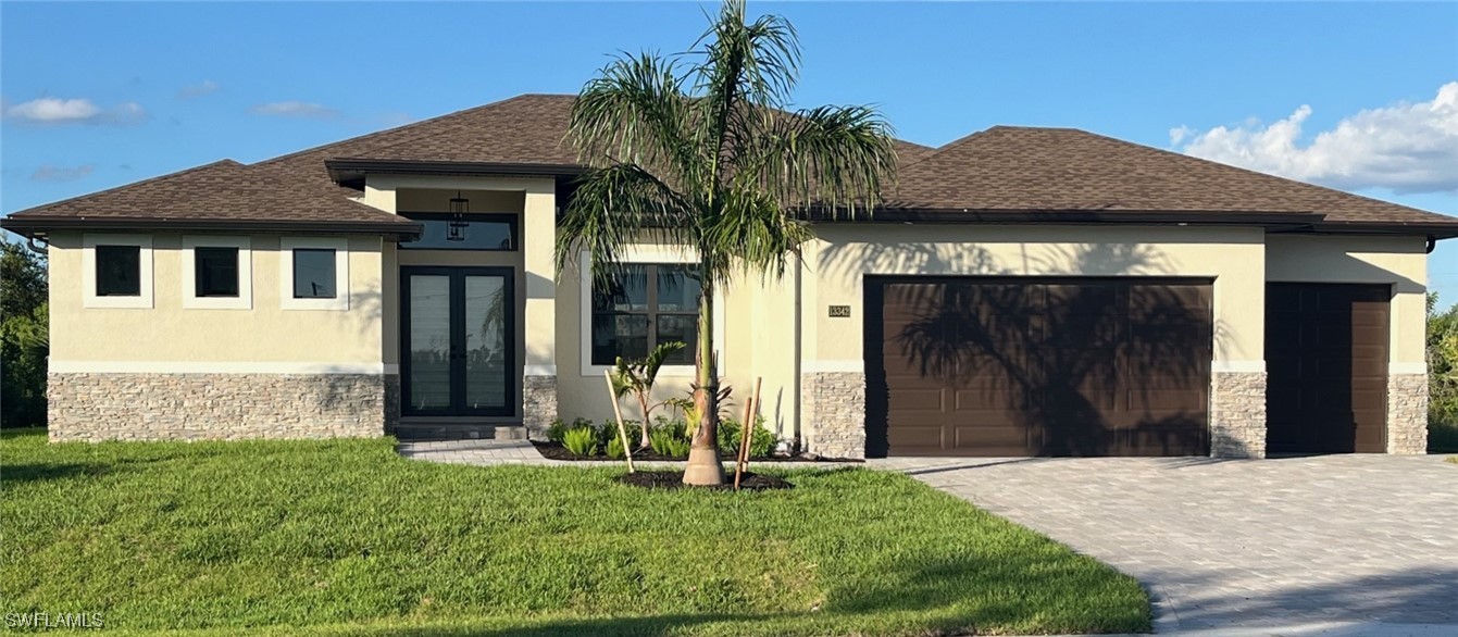 a front view of a house with a yard