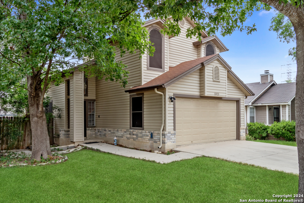 front view of house with a yard