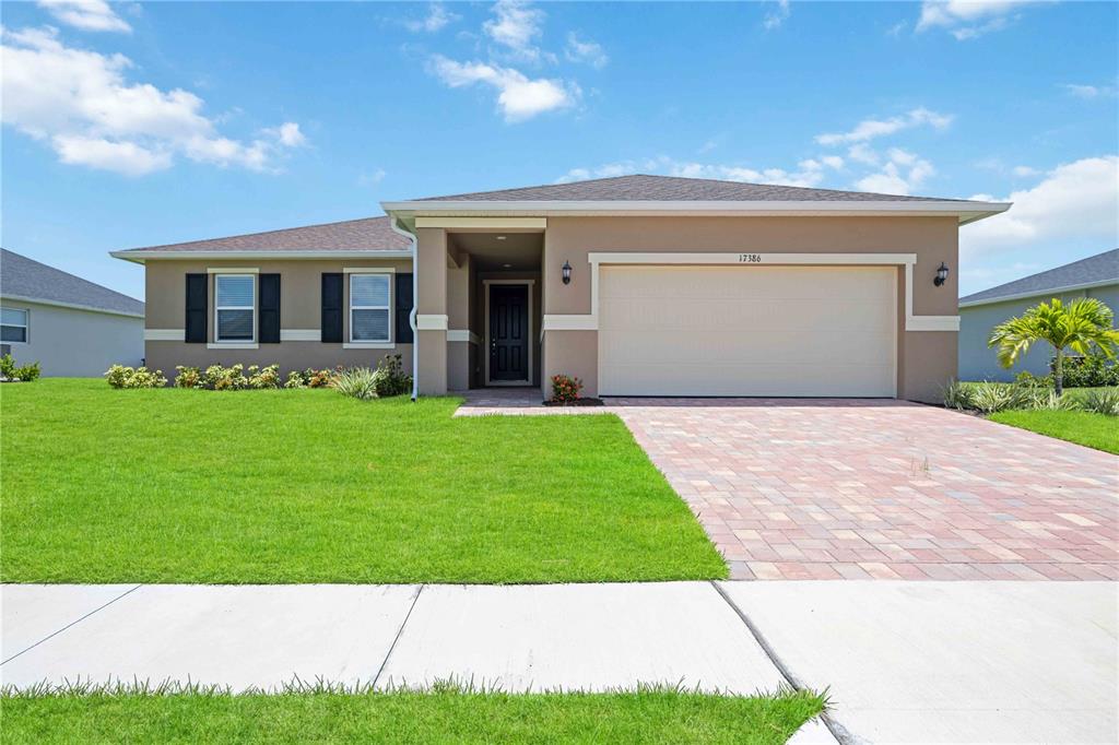 a front view of house with yard