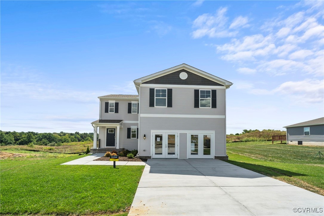 View of front facade featuring french doors and a