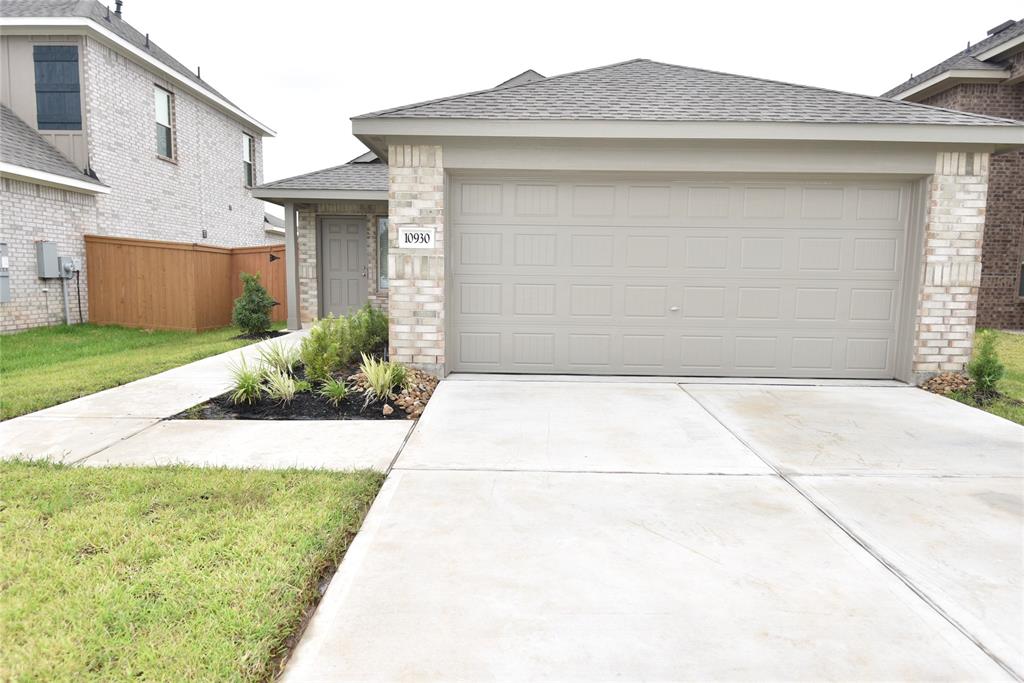 a front view of house with garage