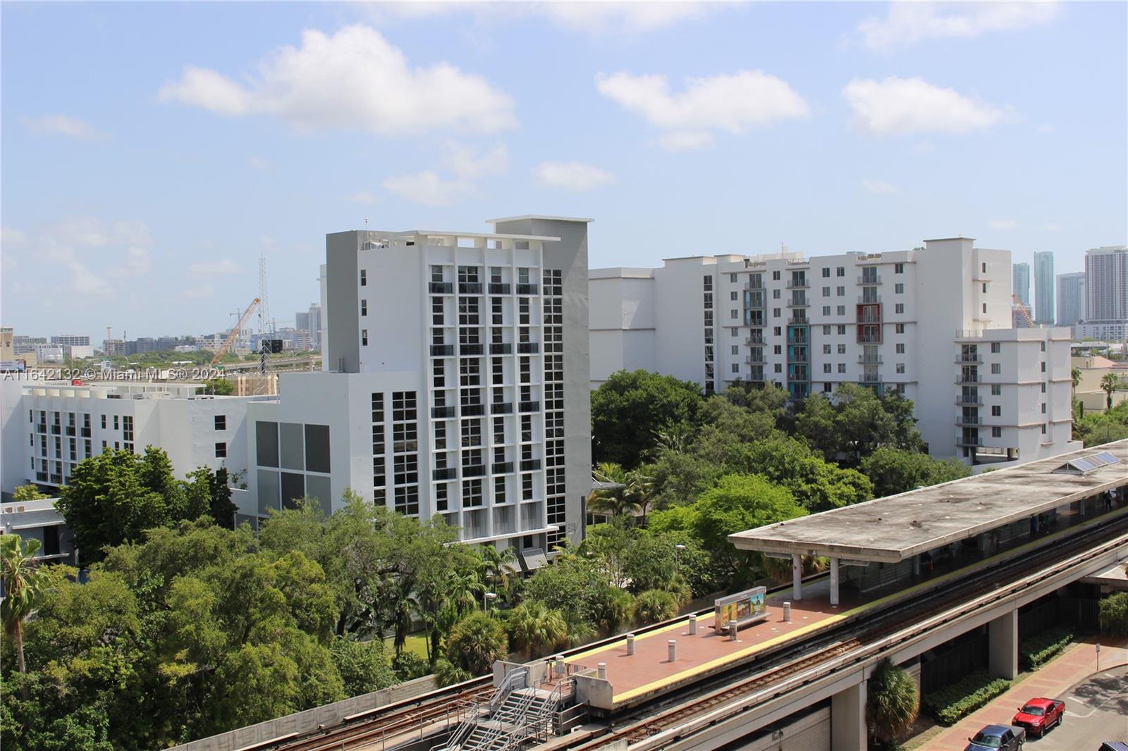 a view of a city with tall buildings