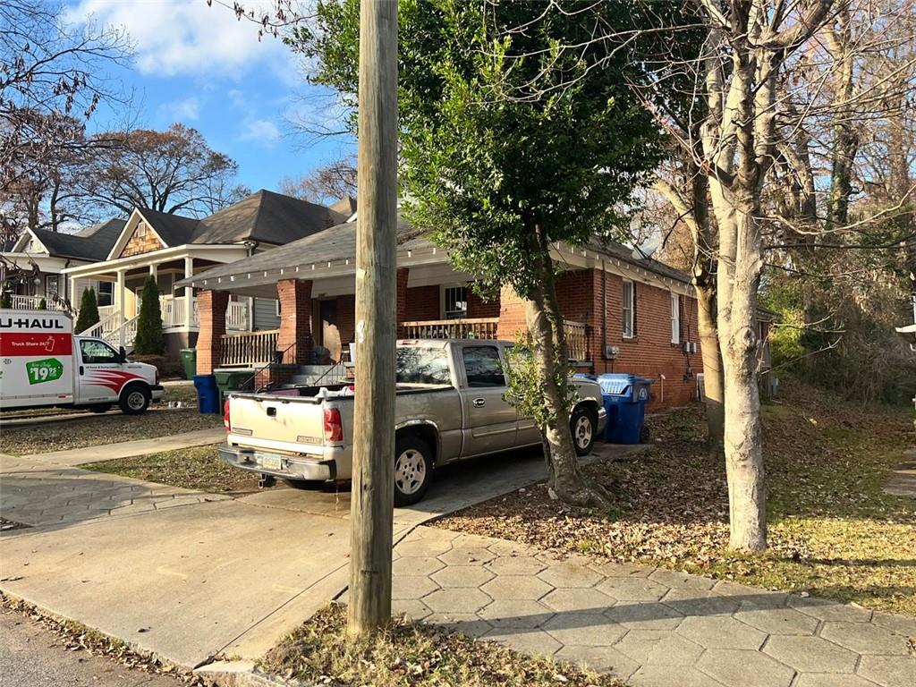 a view of a street with cars