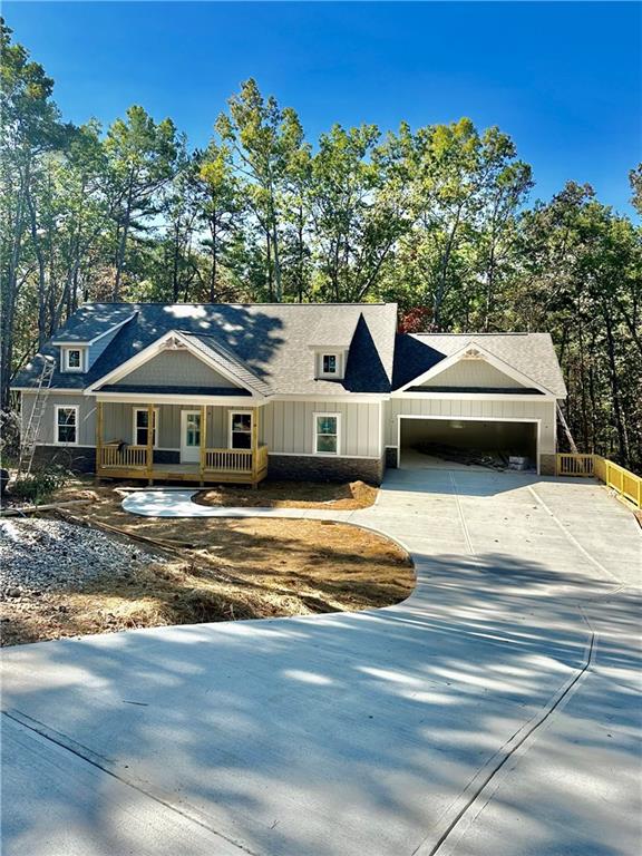 a aerial view of a house with a yard