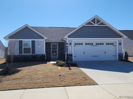 a front view of a house with garage