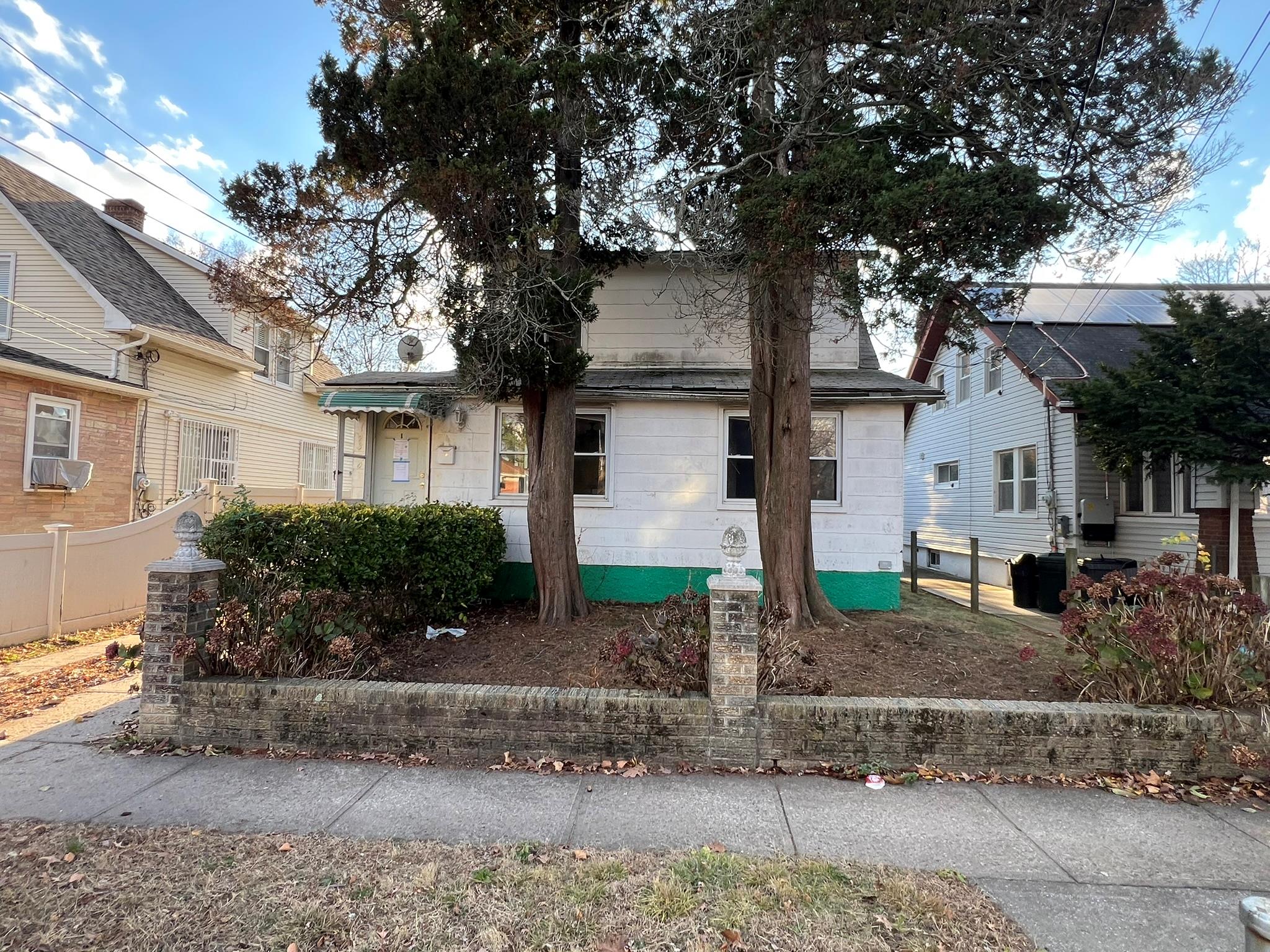 View of front of property featuring cooling unit