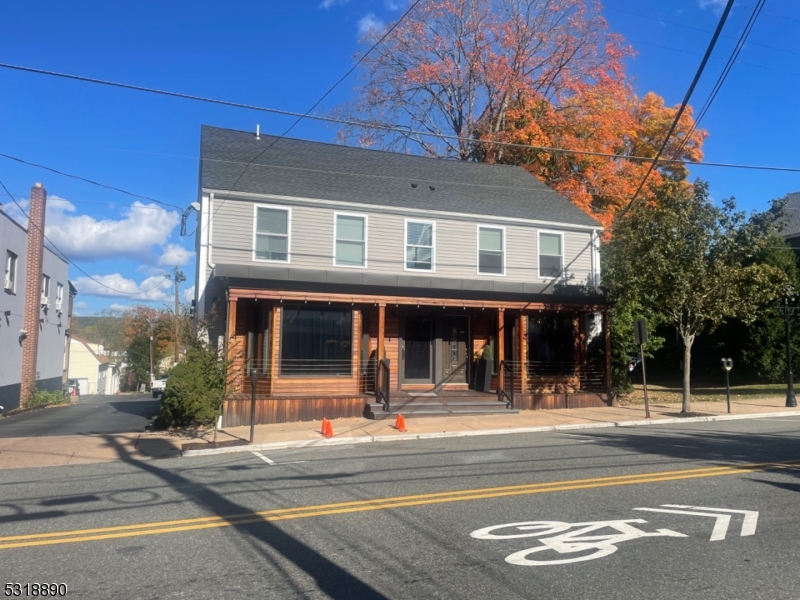 a view of a building with a street