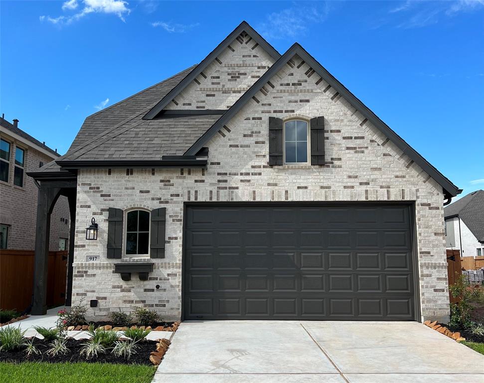 a view of a house with a garage