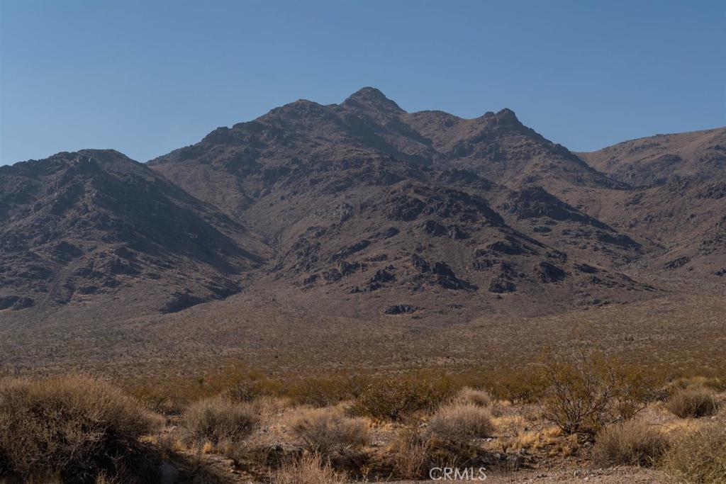 a view of mountains and valleys