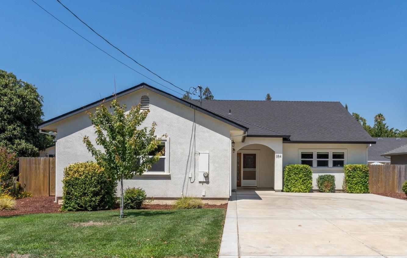 front view of a house with a yard