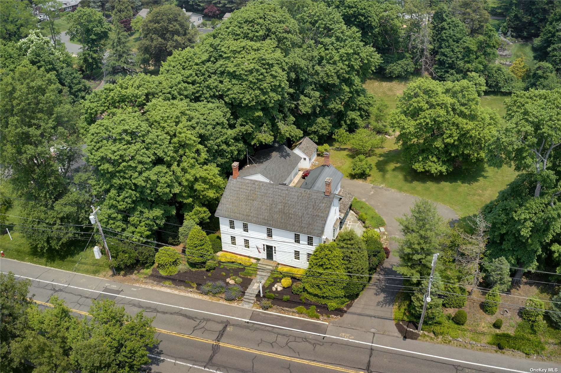 an aerial view of a house with a garden