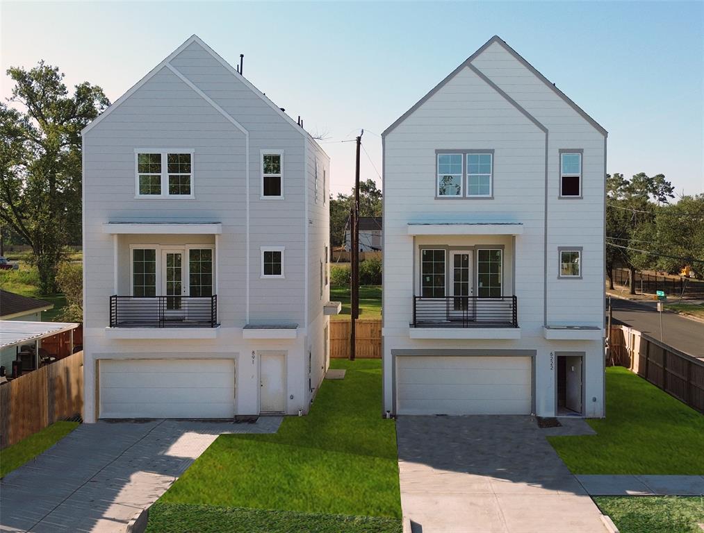 a house view with a garden space