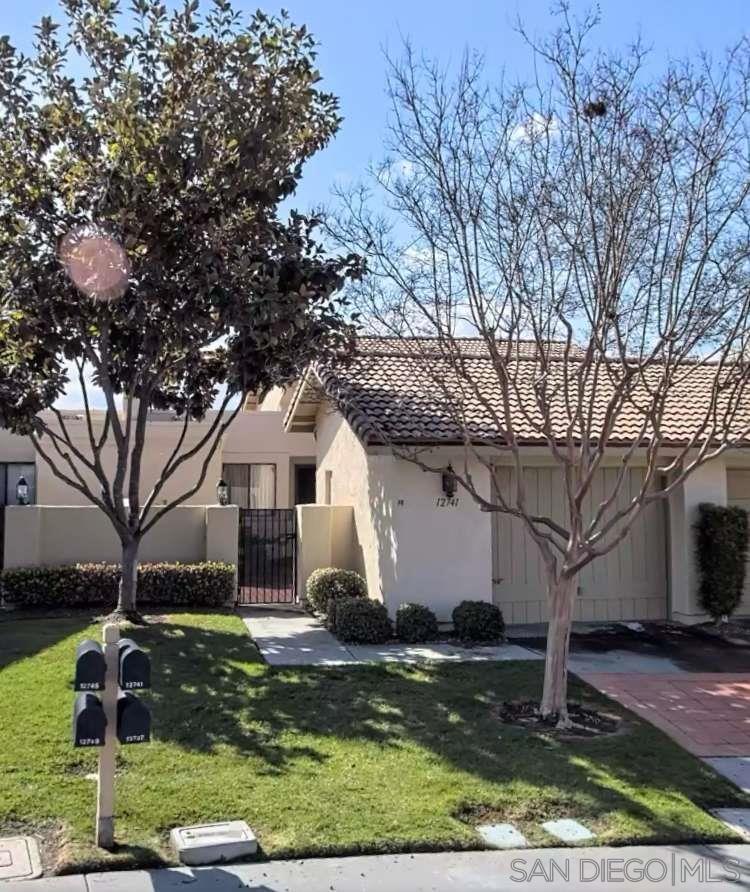 a front view of house with yard