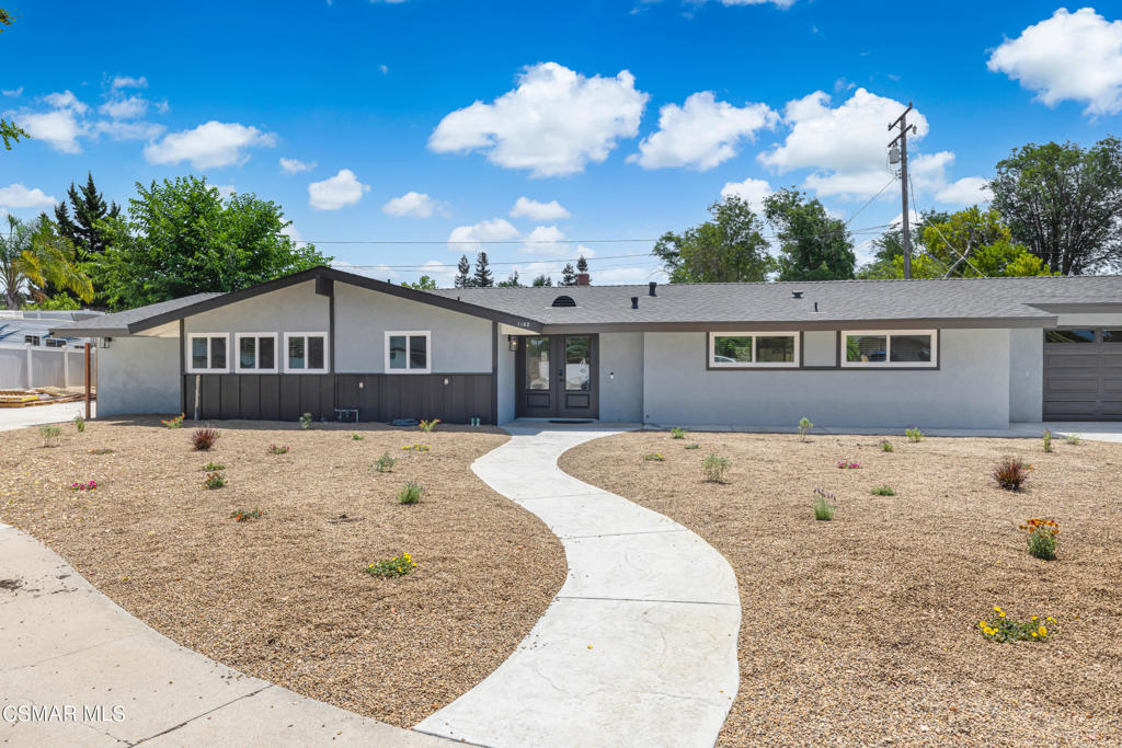 a house view with a outdoor space