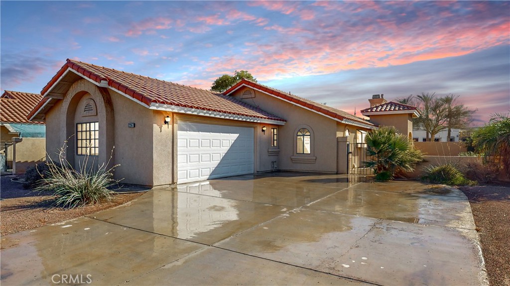 a front view of a house with a garage