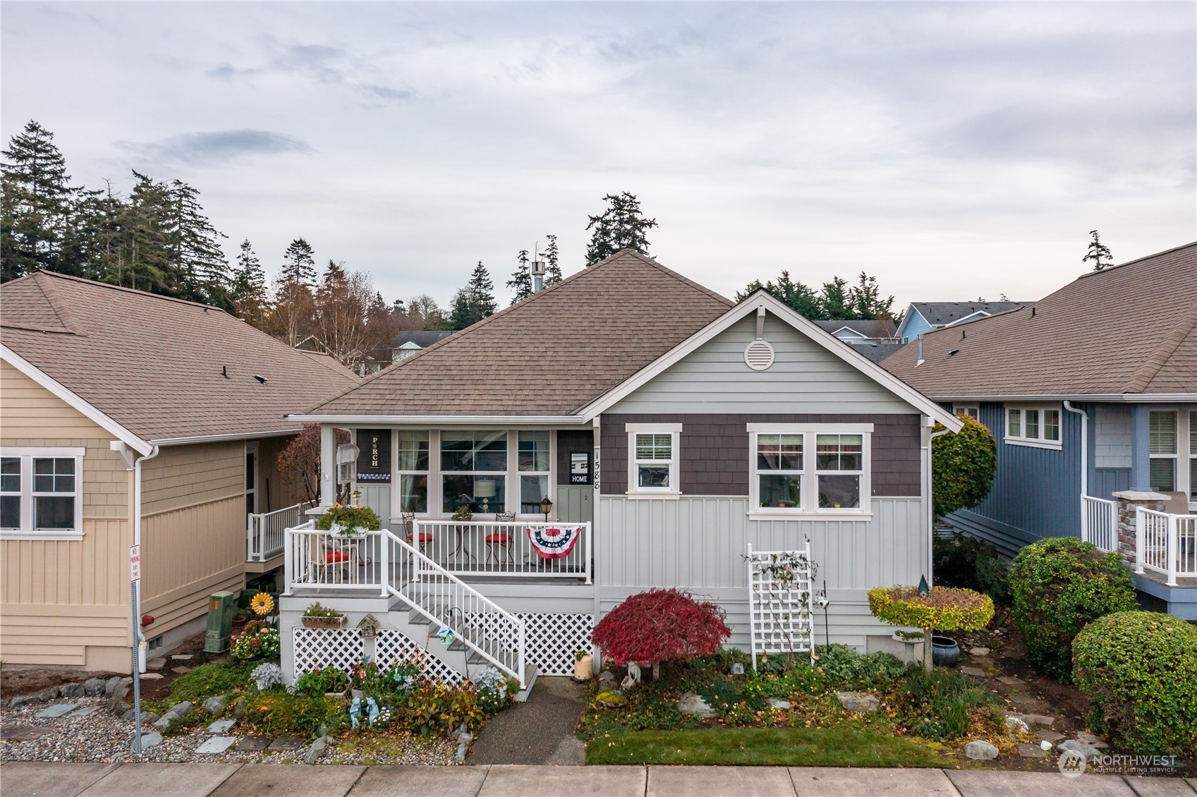 a front view of a house with garden