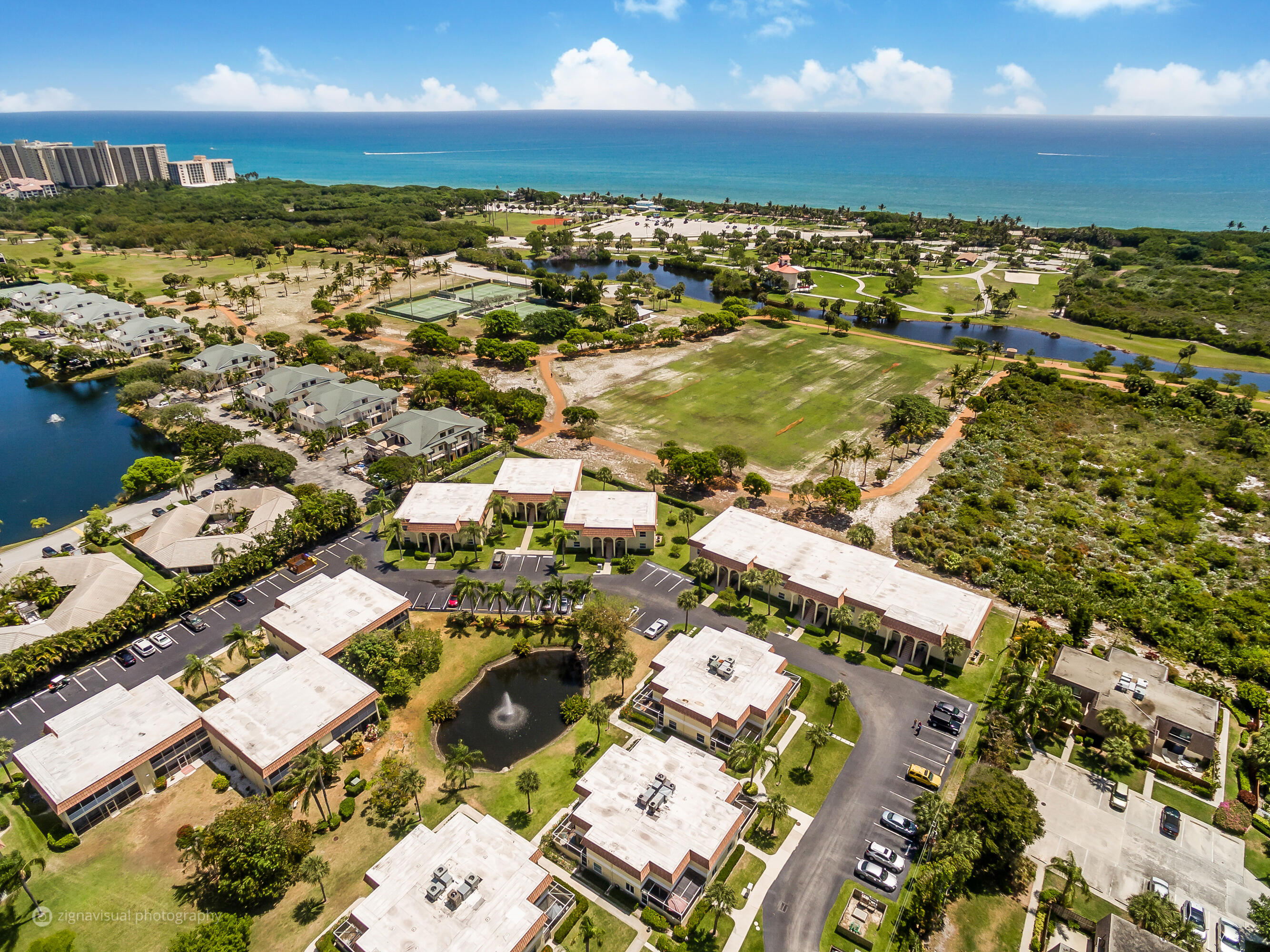 an aerial view of residential building with parking space