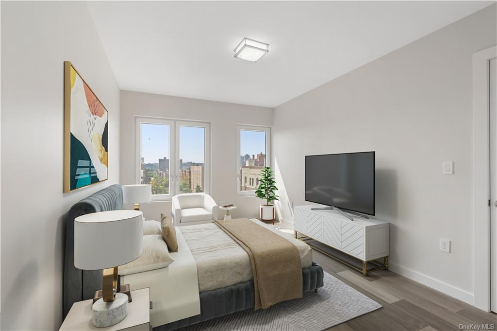 Bedroom with dark wood-type flooring