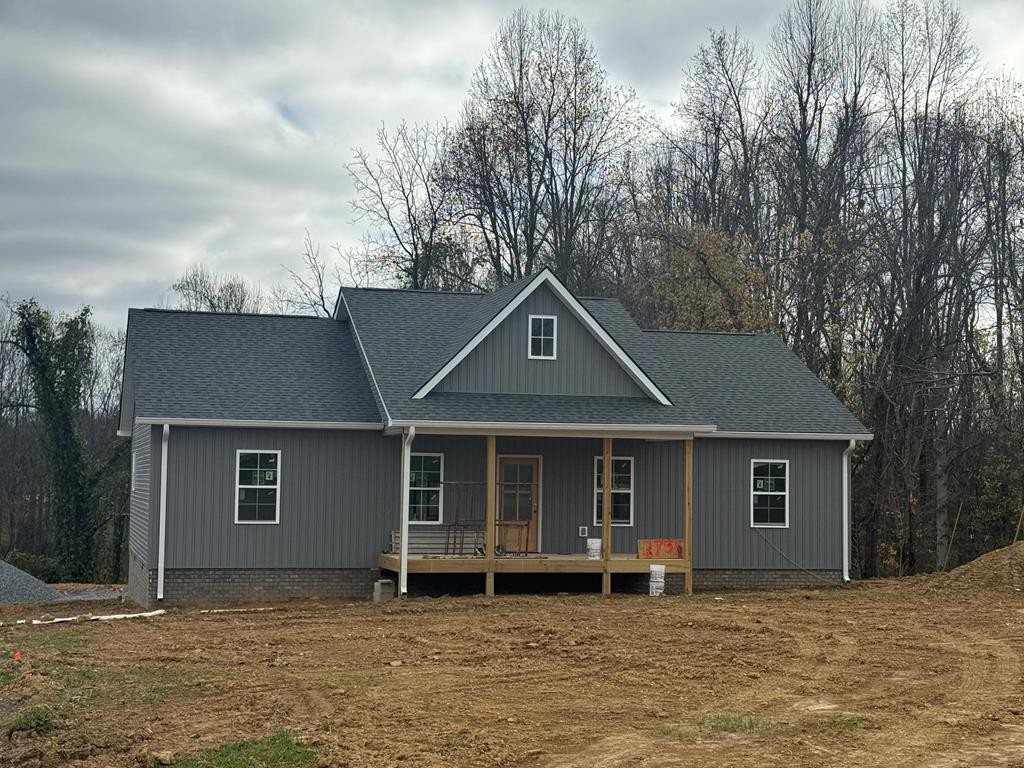 a house with trees in the background