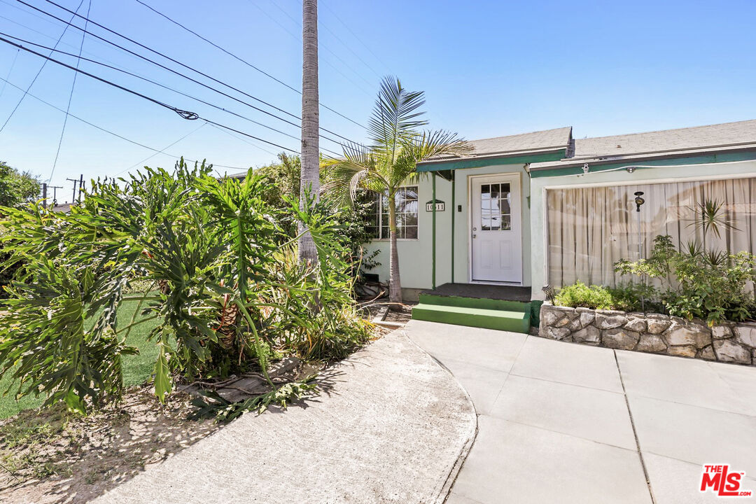 a front view of a house having yard