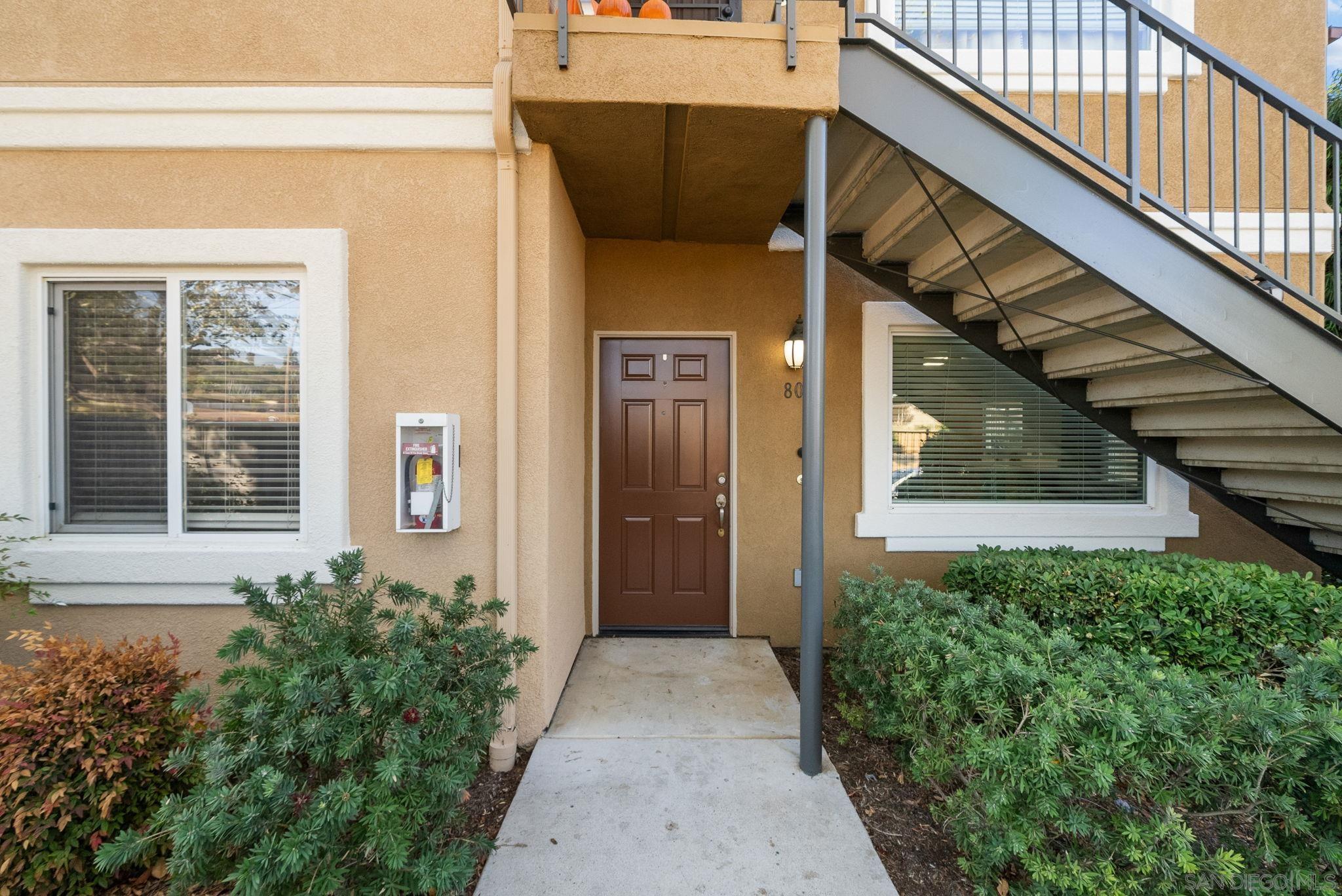 a view of entrance gate of a house