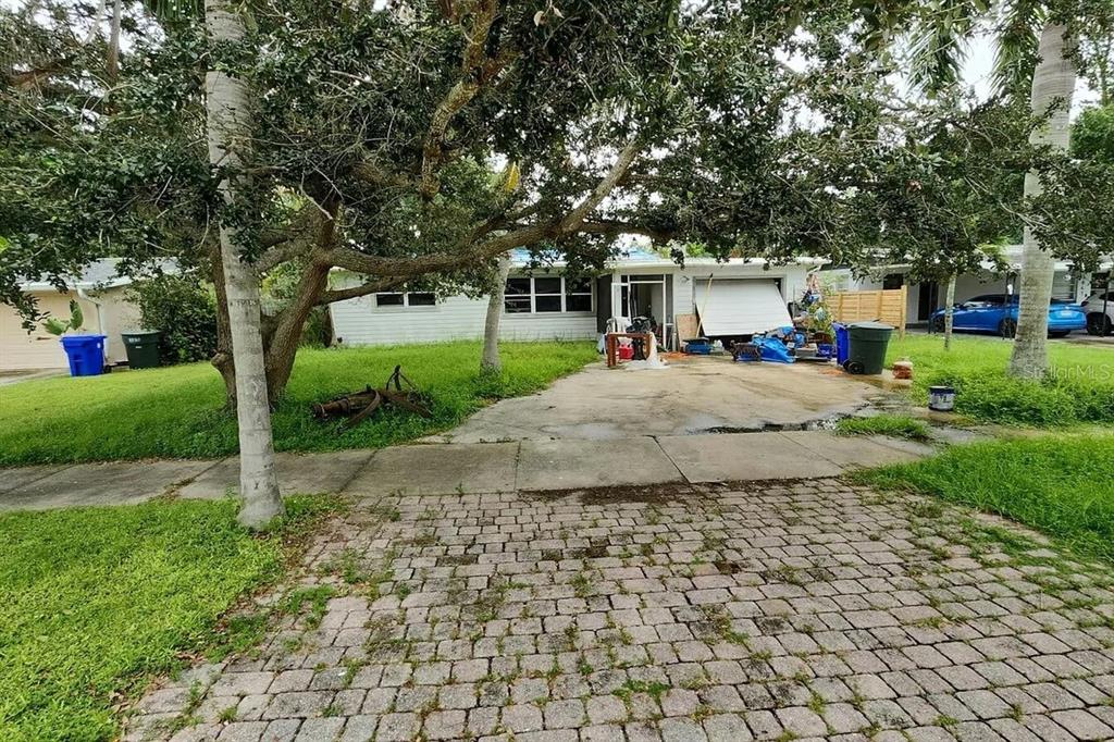 a house with trees in front of it