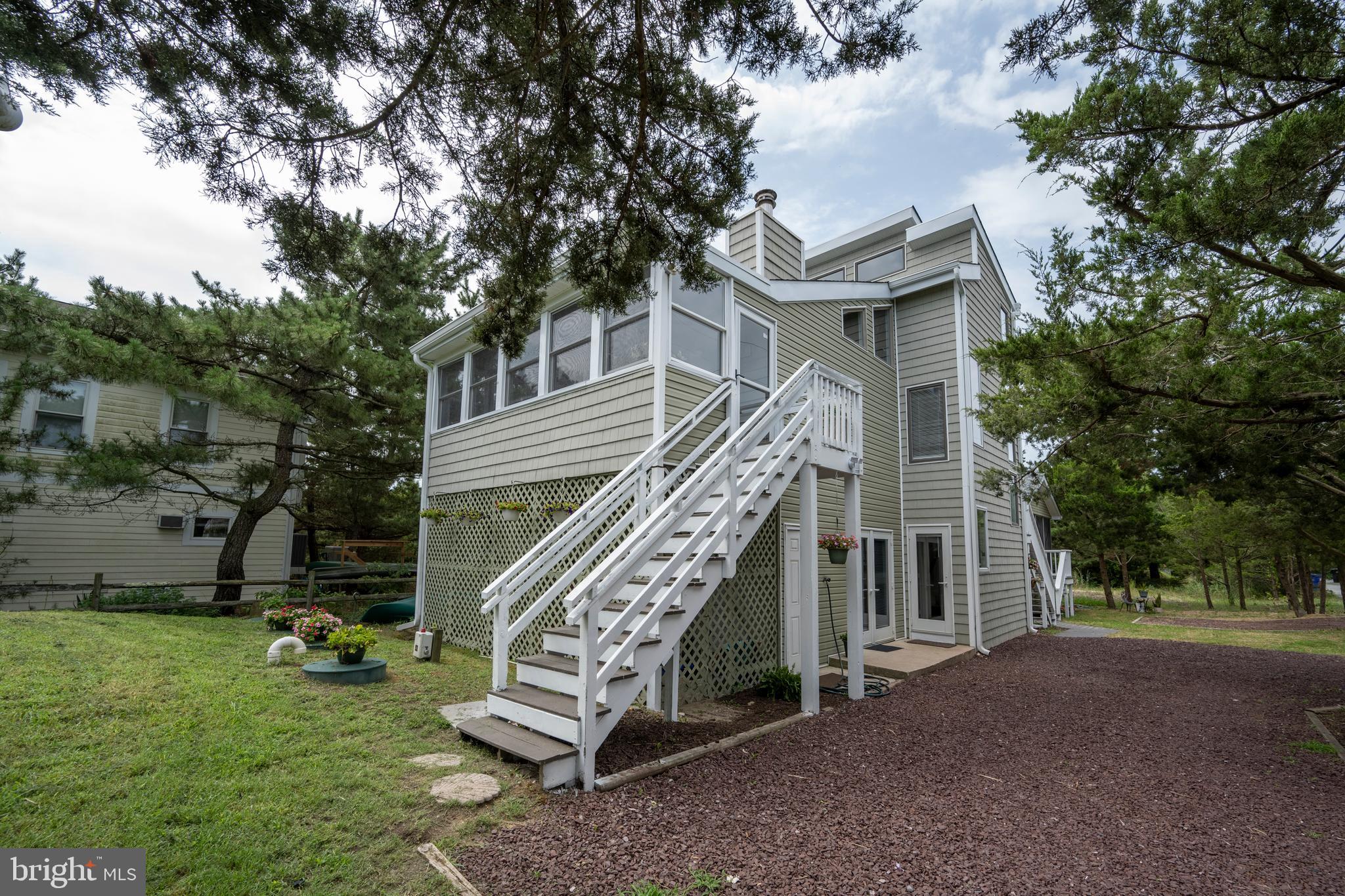 a view of a house with a park