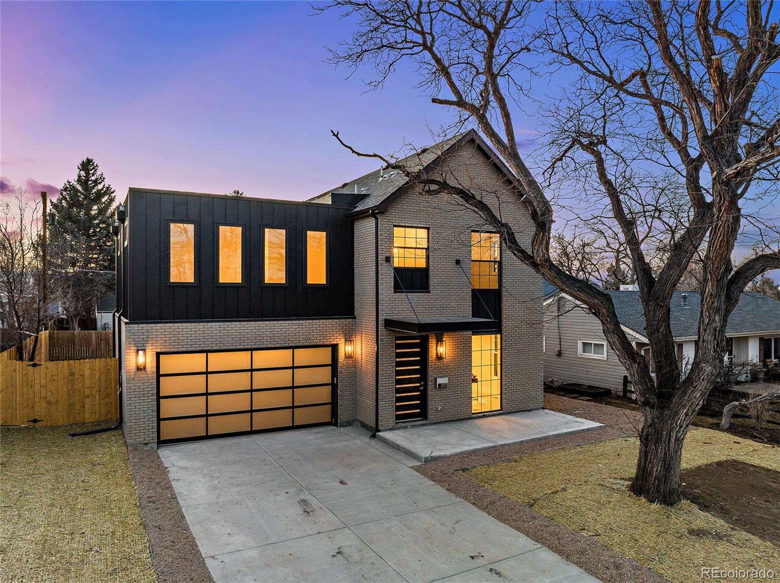 a front view of a house with a garage