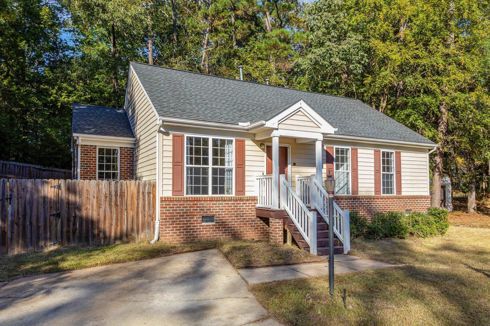 a front view of a house with a porch