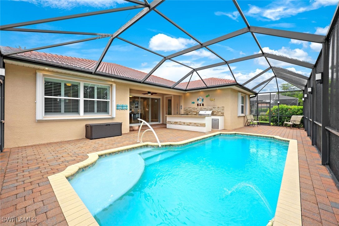 a view of a backyard with swimming pool