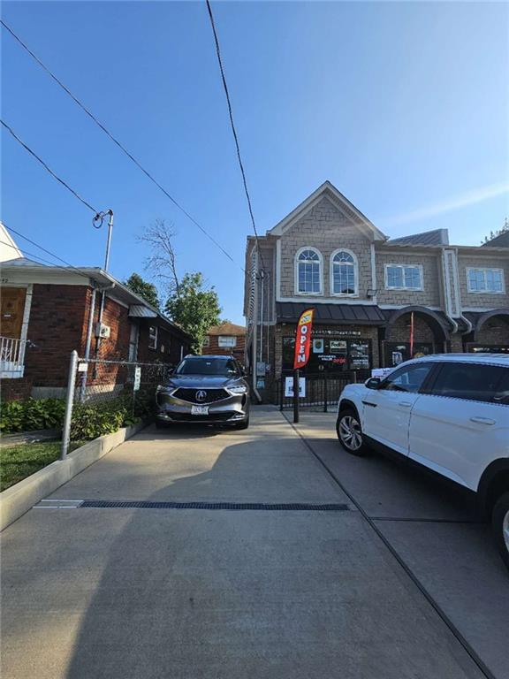 a car parked in front of a house